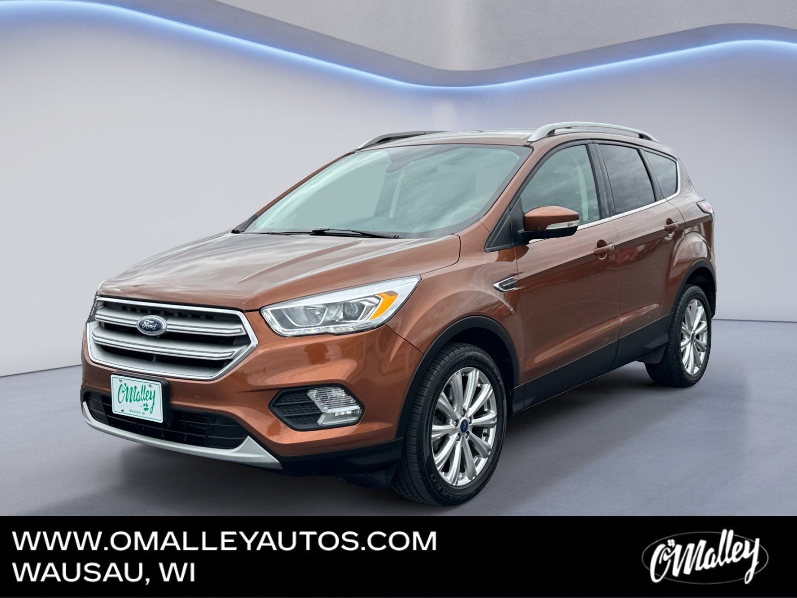 2017 Ford Escape Titanium in Orange — front three-quarter view