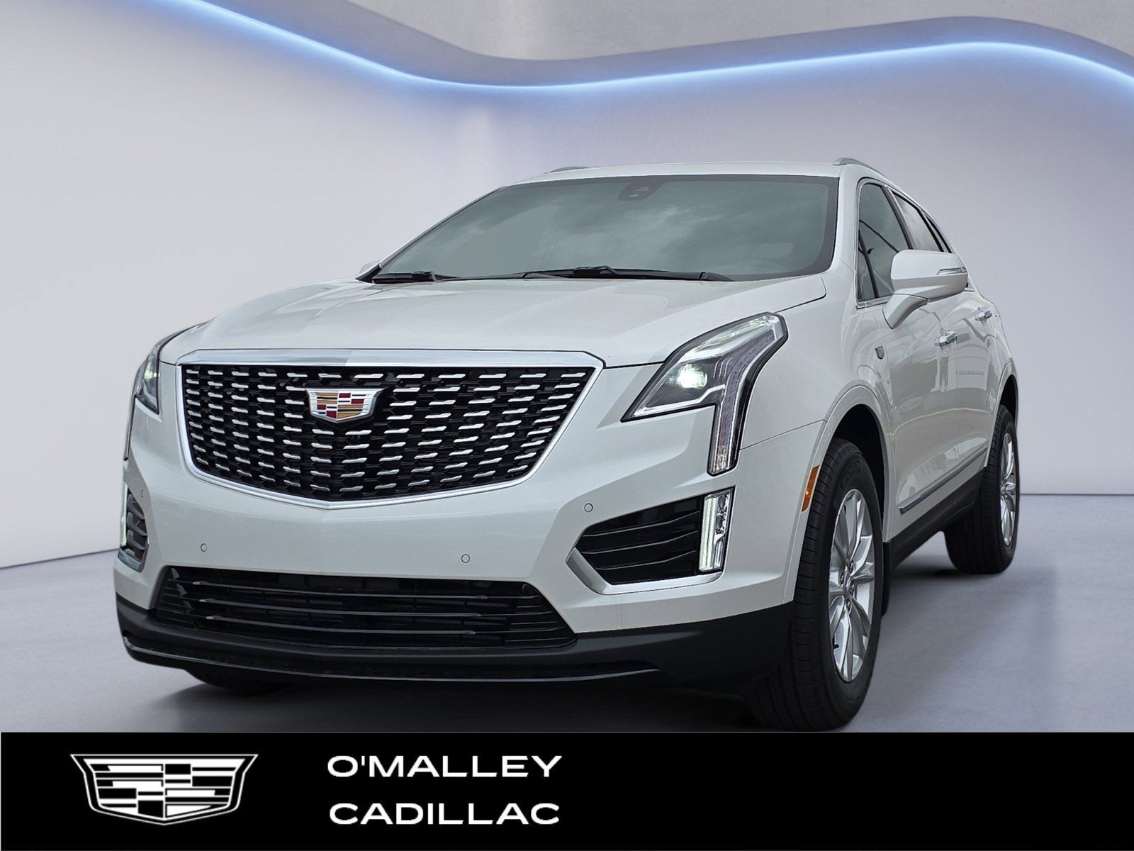 2026 Cadillac XT5 Luxury in Crystal White Tricoat — front three-quarter view