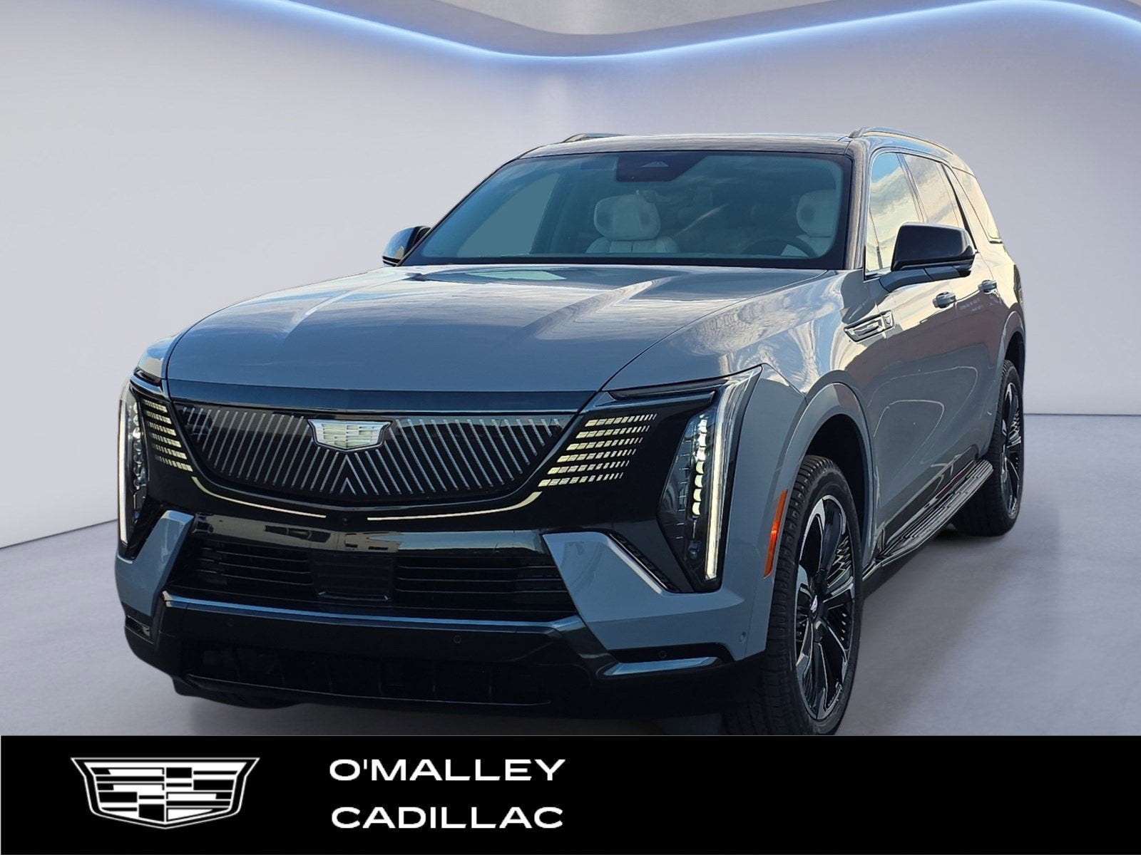2026 Cadillac ESCALADE IQL Sport in Luna Metallic — front three-quarter view