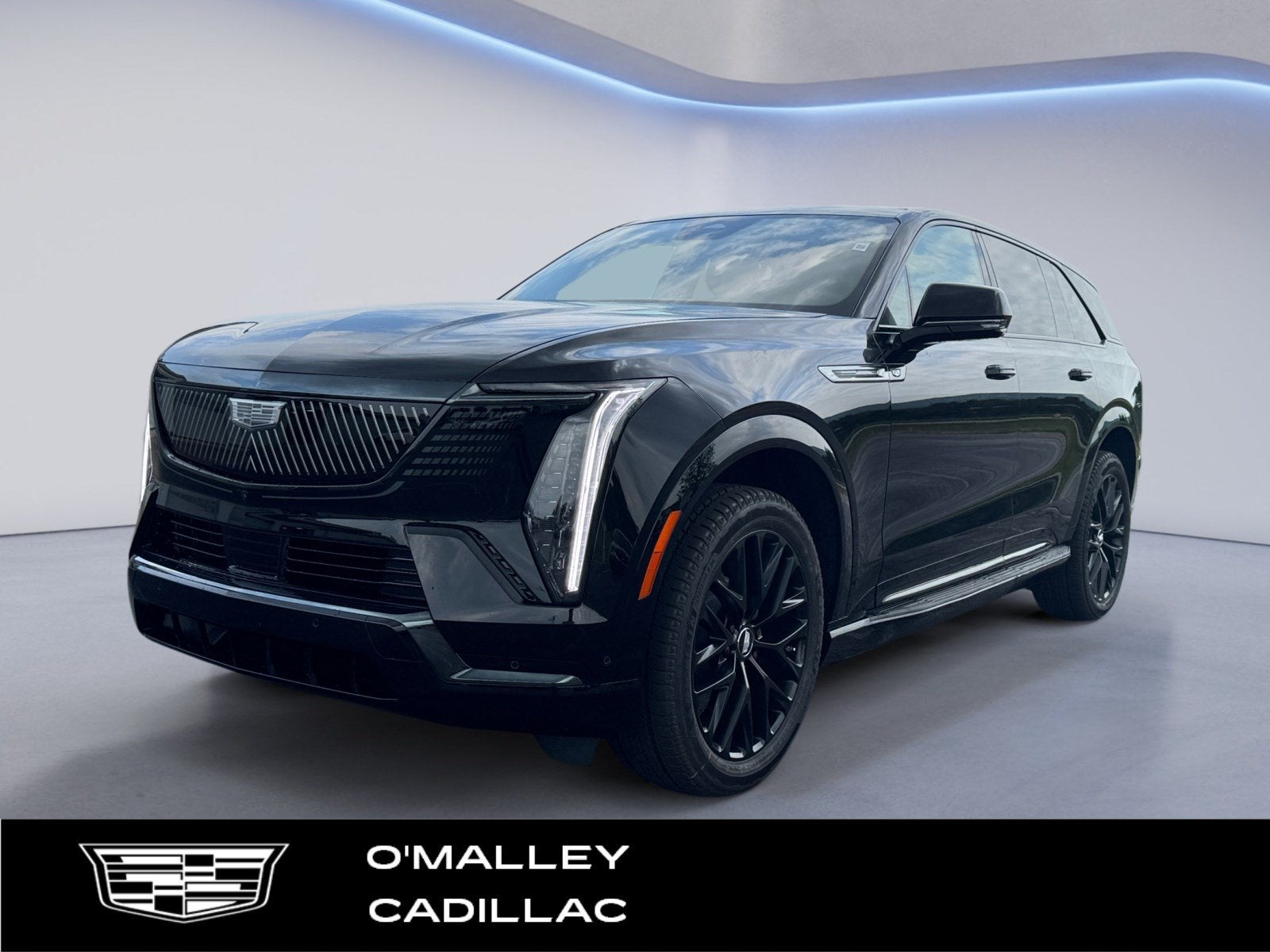 2026 Cadillac ESCALADE IQ Sport in Black Raven — front three-quarter view