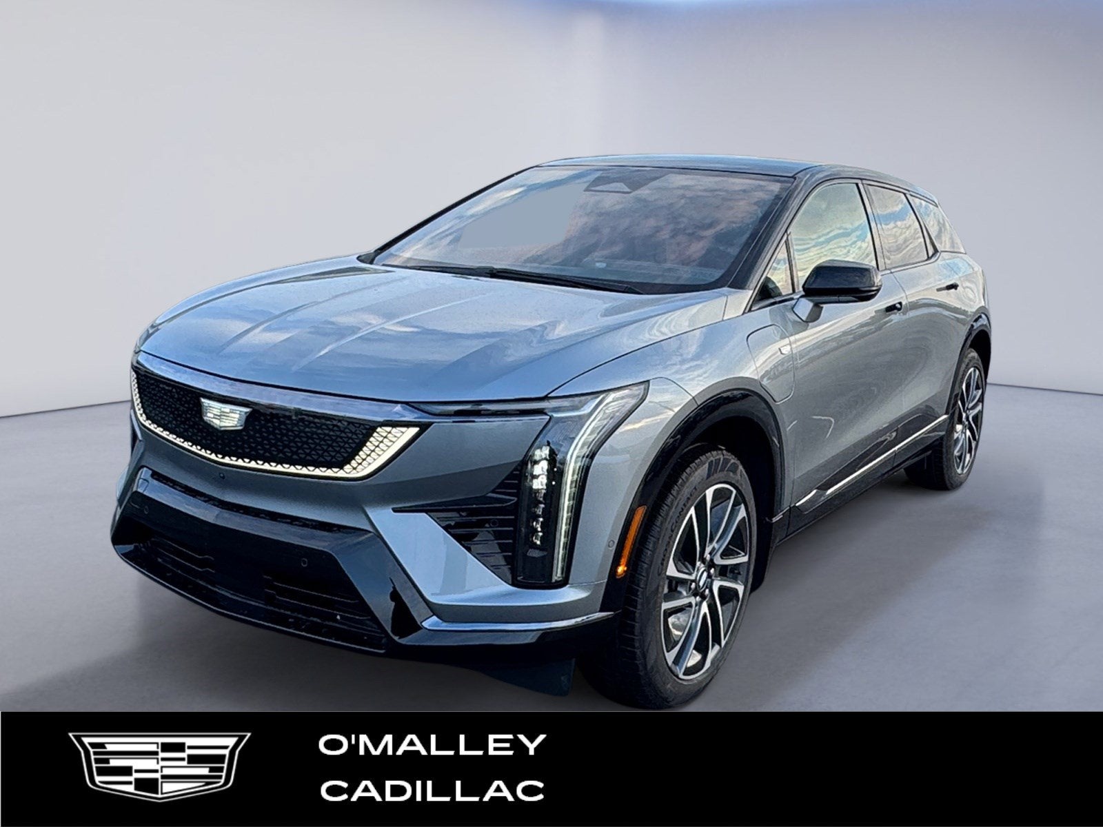 2026 Cadillac OPTIQ Sport in Argent Silver Metallic — front three-quarter view